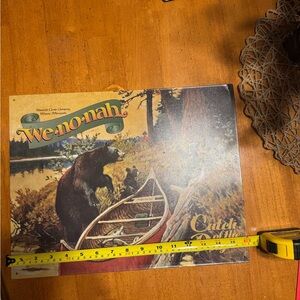 We-no-nah Catch of the Day Tin Sign
Pre-owned.
